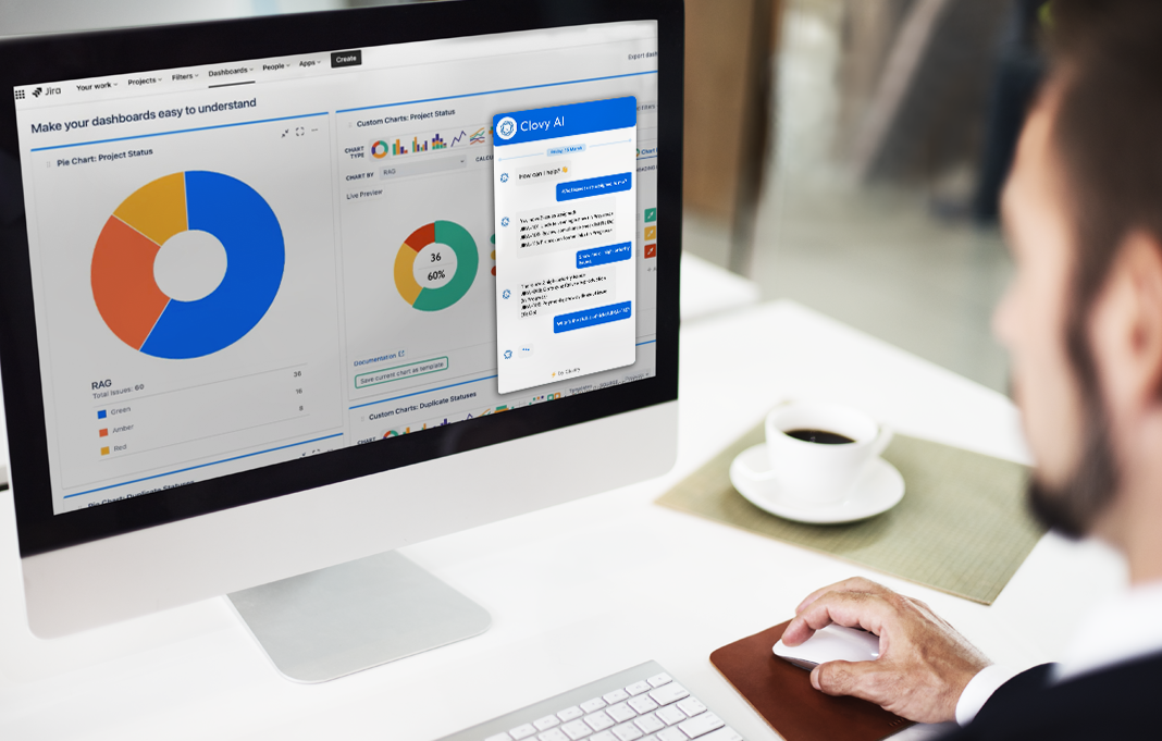 Person using computer with charts and Clovy AI chat window on screen, white desk with coffee cup